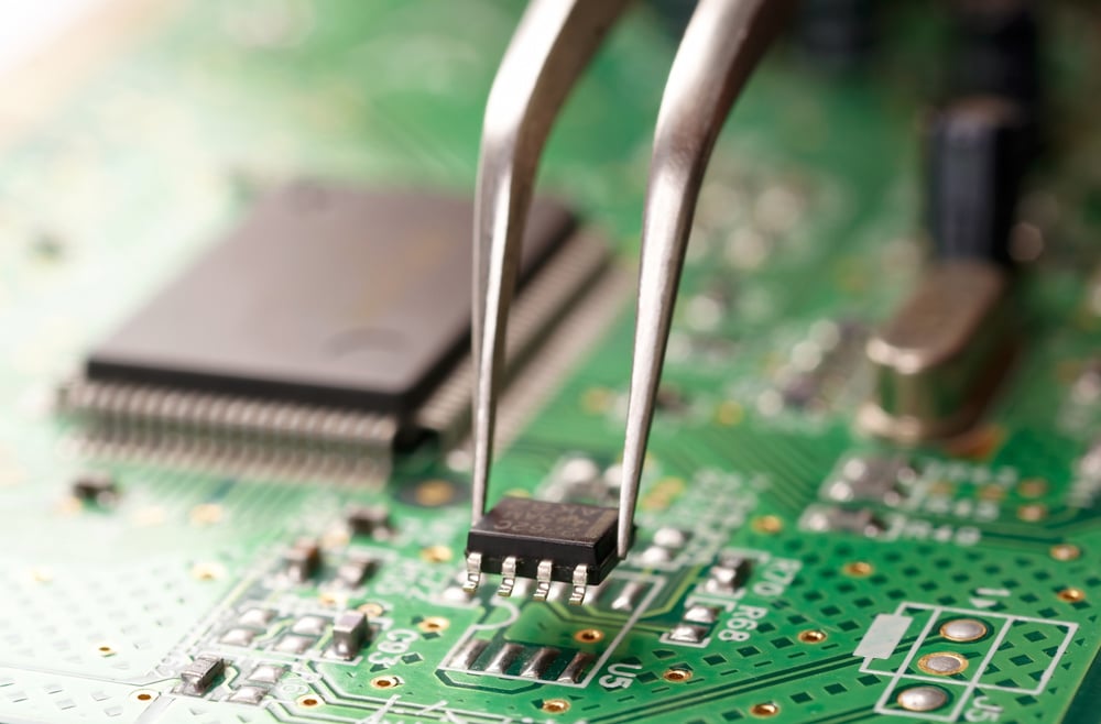 Circuit-board-close-up-tweezer